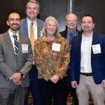 Group of individuals at awards gala