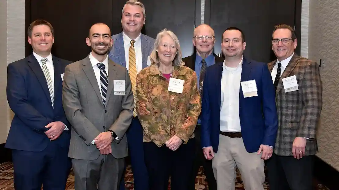Group of individuals at awards gala